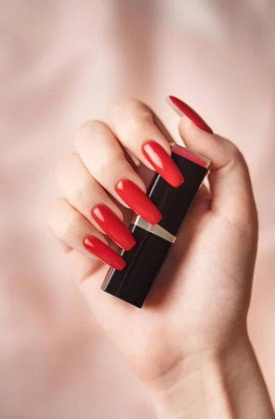 Hand Young Girl Bright Red Manicure Her Nails Holding Tube — Stockfoto