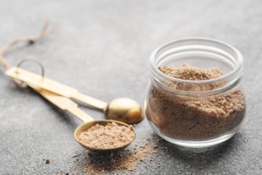 Jar of Hickory smoked  sea salt.  Healthy food concept. Speciality salt.