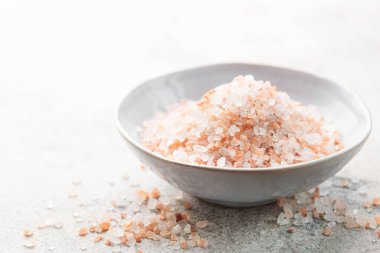 Bowl of himalayan pink salt .  Healthy food concept. Speciality salt. 