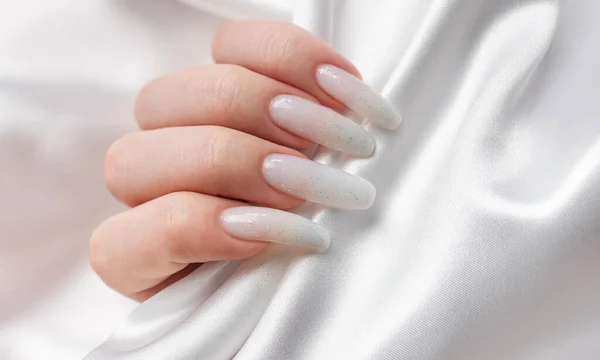 Woman Hands Manicure Them Nails Painted White Color White Silk — Stock Photo, Image