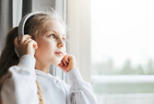 Little Girl Headphones Indoors Home Sitting Window Sill Listening Music — Stock Photo, Image