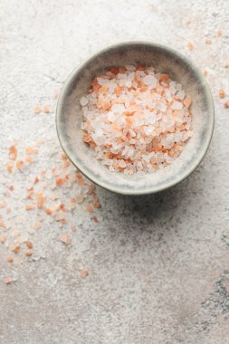 Bowl of himalayan pink salt .  Healthy food concept. Speciality salt.