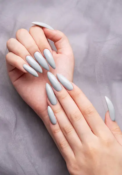Beautiful Painted Grey Nails Grey Lace Background — Stock Photo, Image