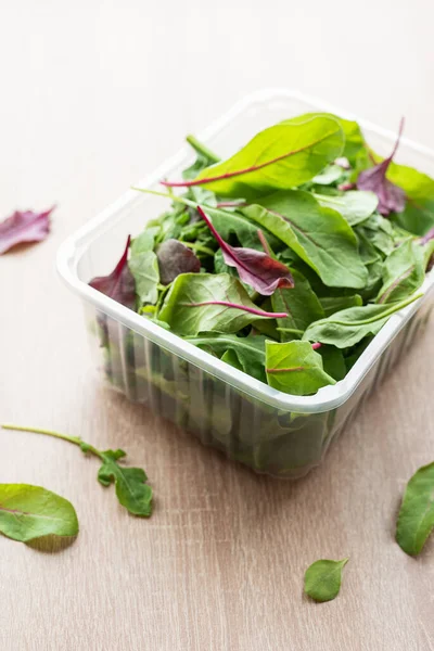 Salad mix in a box.  Fresh mixed salad leaves in plastic container