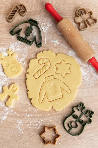 Christmas baking, gingerbread cookies. Making Christmas Cookies with traditional gingerbread cookies ingredients.
