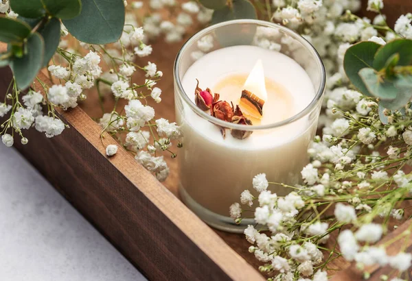 Aromatic candle on the table.  Soy candles  in a jar. Aromatherapy and relax in spa and home. Still life.