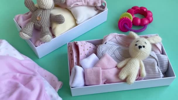 Baby Child Clothes Knitted Toys Carton Box Donation Charity Concept — Stock Video
