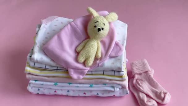 Stack Baby Bodysuits Baby Knitted Toy Bunny Next Stack Rompers — Stock Video