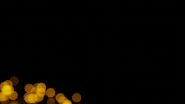 Bokeh Shiny颗粒光环动画 黑色背景上的橙色颗粒 晶莹粒子 — 图库视频影像