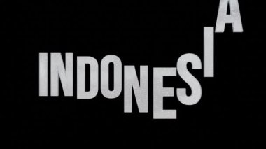Siyah izole edilmiş arkaplan 3d resimleme 4k video döngüsü üzerindeki metin Endonezya animasyonu