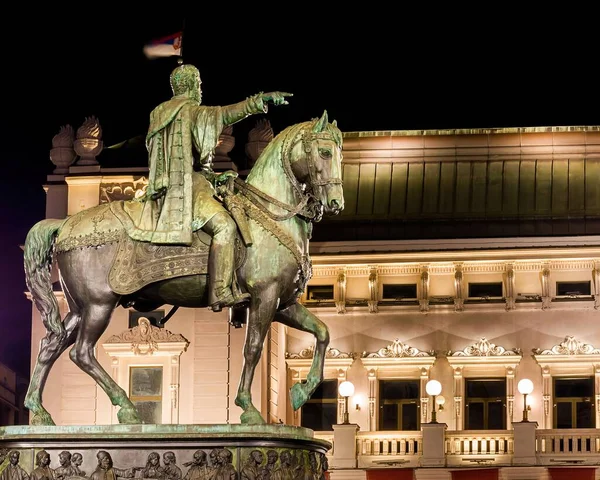 stock image BELGRADE, SERBIA - AUGUST 12 2022: night scene of Prince Mihailo Monument , located on famous Republic Square (Trg Republike) with National Museum.