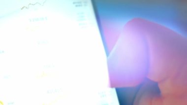 Caucasian male making a payment with bitcoins cryptocurrency using his smartphone. Custom application interface design. Light rays effect.