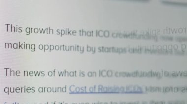 Abstract animation of holographic ICO text appearing in the middle of virtual reality room. Great clip for concepts about Initial Coin Offering and crypto currency.