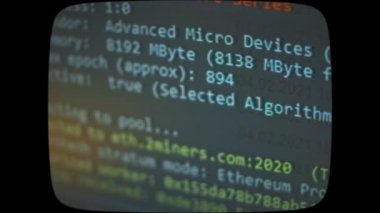 Cryptocurrency mining on a computer screen. The algorithm of the computer program on the monitor. Execution of the program code for the mining program. Pop-up lines of a computer program.