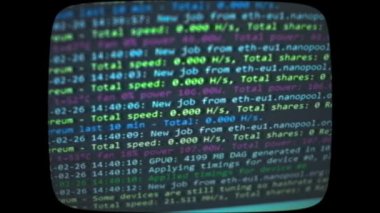 Cryptocurrency mining on a computer screen. The algorithm of the computer program on the monitor. Execution of the program code for the mining program. Pop-up lines of a computer program.
