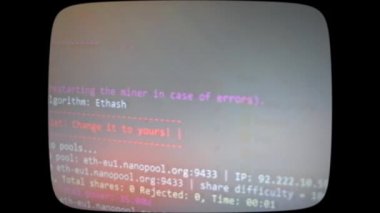 Cryptocurrency mining on a computer screen. The algorithm of the computer program on the monitor. Execution of the program code for the mining program. Pop-up lines of a computer program.