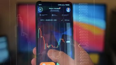 Caucasian male making a payment with bitcoins cryptocurrency using his smartphone. Custom application interface design. 4K UHD RAW edited footage