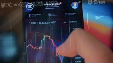 Caucasian male making a payment with bitcoins cryptocurrency using his smartphone. Custom application interface design. 4K UHD RAW edited footage