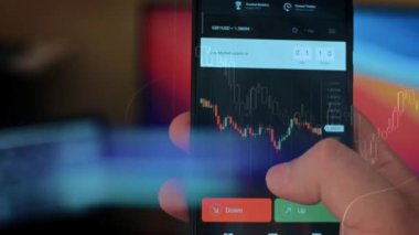 Caucasian male making a payment with bitcoins cryptocurrency using his smartphone. Custom application interface design. 4K UHD RAW edited footage