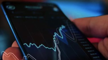 Caucasian male making a payment with bitcoins cryptocurrency using his smartphone. Custom application interface design. 4K UHD RAW edited footage