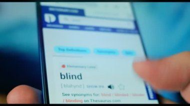 Looking at the smartphone, questions about the blind.