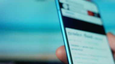 Looking at the smartphone, questions about gender fluid.