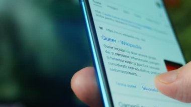 Looking at the smartphone, queer questions.