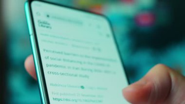 Looking at the smartphone, social distancing questions.