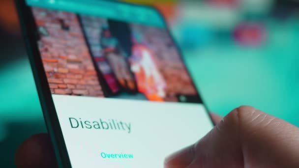 Looking Smartphone Read Information Disability — Vídeo de Stock