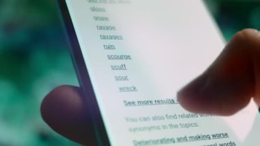 Looking at the smartphone, I read information about impairment.