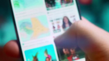 Smartphone in hand, macro view of the Pacific Islander question