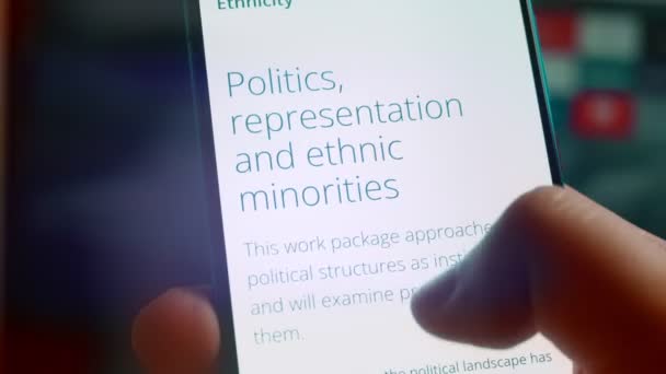 Looking Smartphone Read Information Minorities Politics — Vídeo de Stock