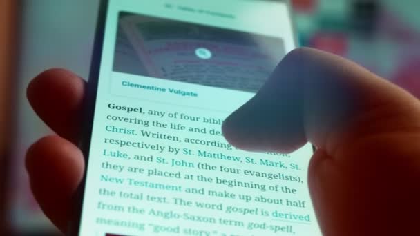 Looking Smartphone Read Information Gospel — Vídeos de Stock