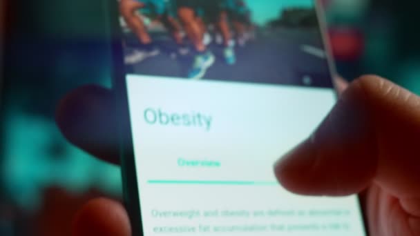 Looking Smartphone Read Information Obesity — Stockvideo