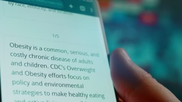 Looking Smartphone Read Information Obesity — Vídeo de Stock