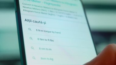 Smartphone in hand, looking for information about 8 mm.