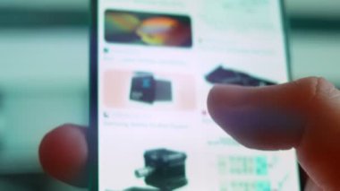 Smartphone in hand, looking for information about 8 mm.