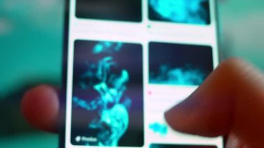 Smartphone in hand, Im looking for information on the internet about blue smoke.