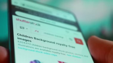 Smartphone in hand, Im looking for information on the Internet about childrens background.