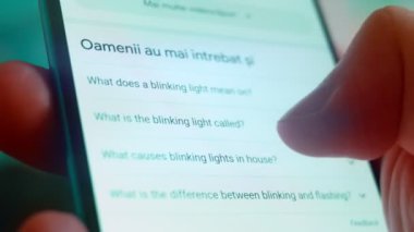 Smartphone in hand, Im looking for information on the internet about blinking light.