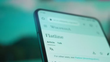 Smartphone in hand, Im looking for information on the internet about flat line.