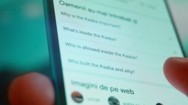 Smartphone in hand, Im looking for information on the Internet about the Kaaba.