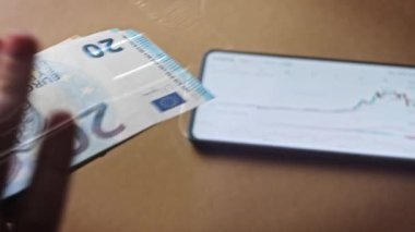 hologram effect of Euro Banknotes and Bitcoin cryptocurrency investing concept, flying money. Euro Money and Crypto currency golden bitcoin coin.