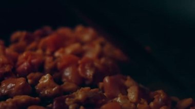 Process of preparing Irresistible chili cheese Hot Dogs. Taste USA cuisine.