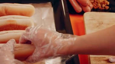 Process of preparing Irresistible chili cheese Hot Dogs. Taste USA cuisine.
