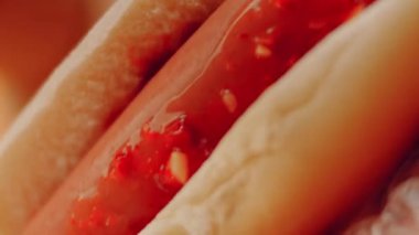 Process of preparing Irresistible chili cheese Hot Dogs. Taste USA cuisine.