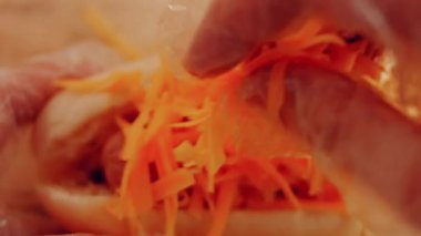 Process of preparing Irresistible chili cheese Hot Dogs. Taste USA cuisine.