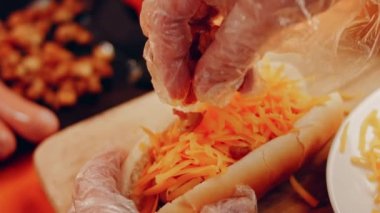 Process of preparing Irresistible chili cheese Hot Dogs. Taste USA cuisine.