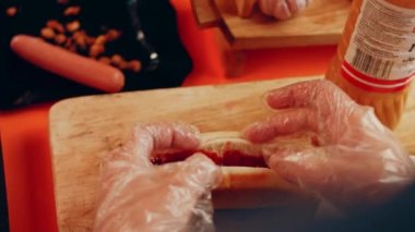 Process of preparing Irresistible chili cheese Hot Dogs. Taste USA cuisine.