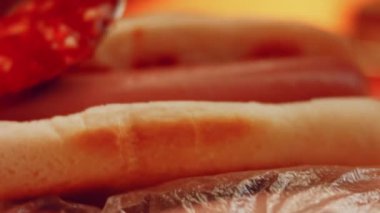 Process of preparing Irresistible chili cheese Hot Dogs. Taste USA cuisine.